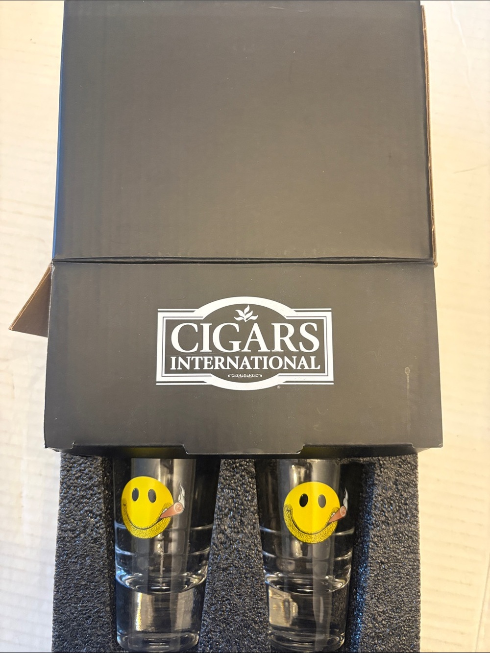 Cigars International Smiley Shot Glasses - Black Box with Yellow Smiley